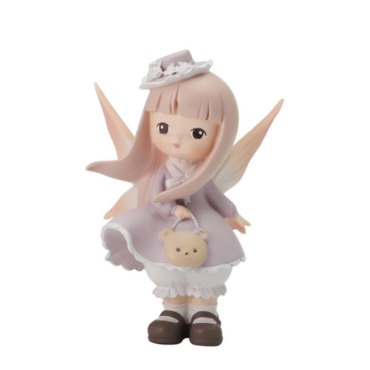 Figurine fée avec un sac