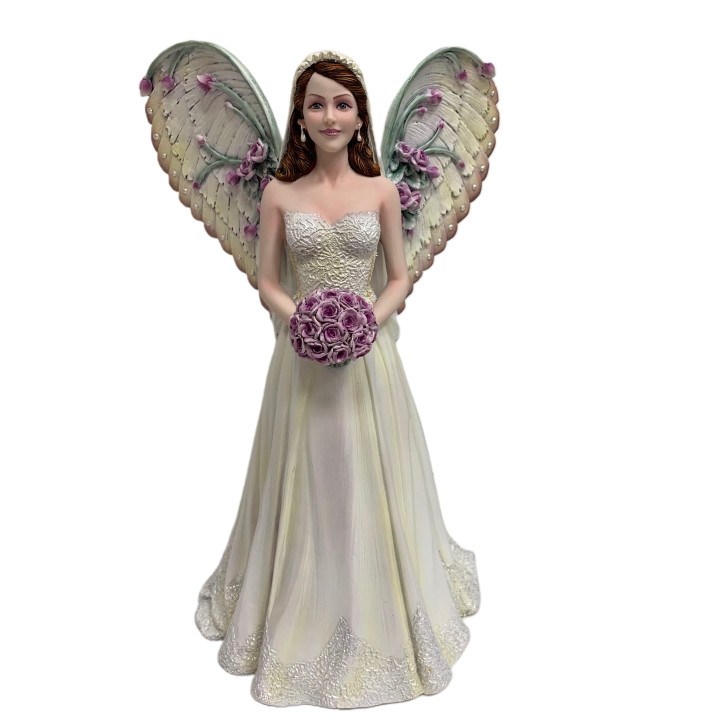 Fée mariée avec bouquet d