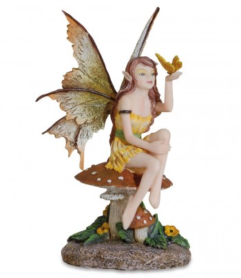 Amy Brown  Fairy seduta su...