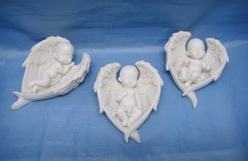 Bebê dormindo em asas 7*9...