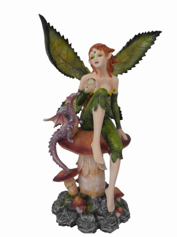 Fée verte sur champignon